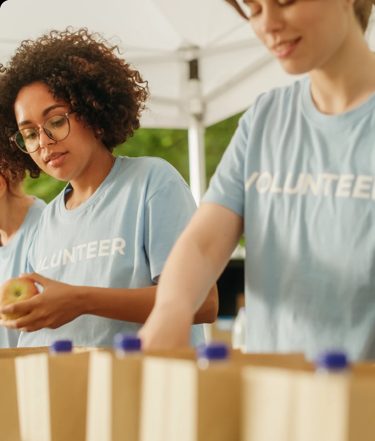 Volunteers packing boxes